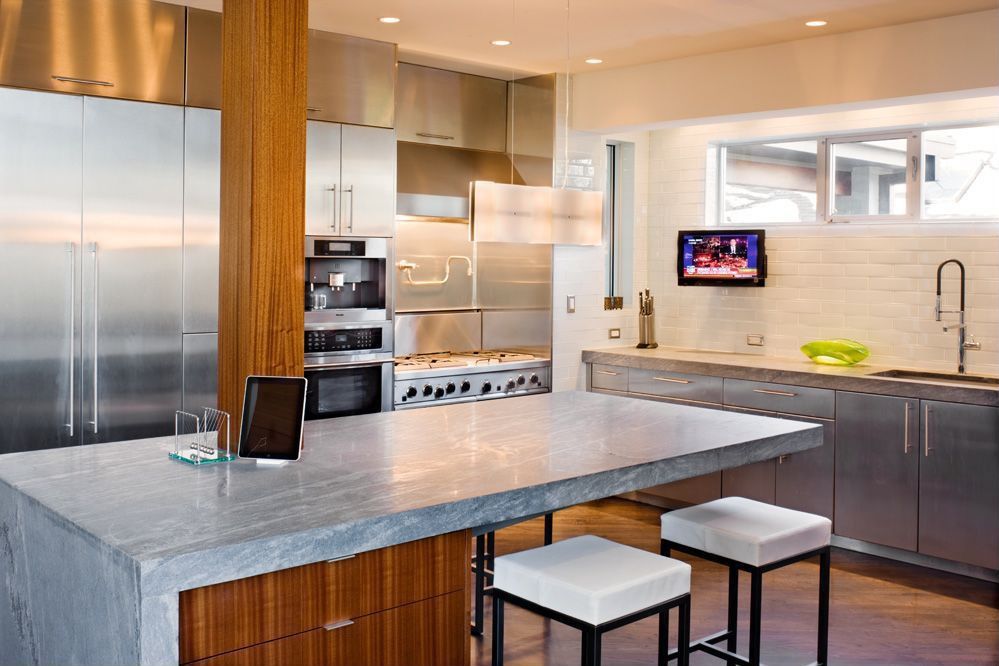 Contemporary Kitchen with Custom hood, Complex marble counters, full backsplash, Casement, Flush, electric cooktop, wall oven