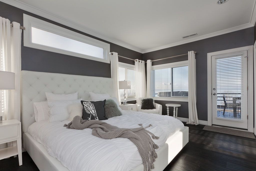 Contemporary Guest Bedroom with Paint, Pottery Barn Lorraine Tufted Tall Headboard & Bed, Crown molding, can lights, Casement