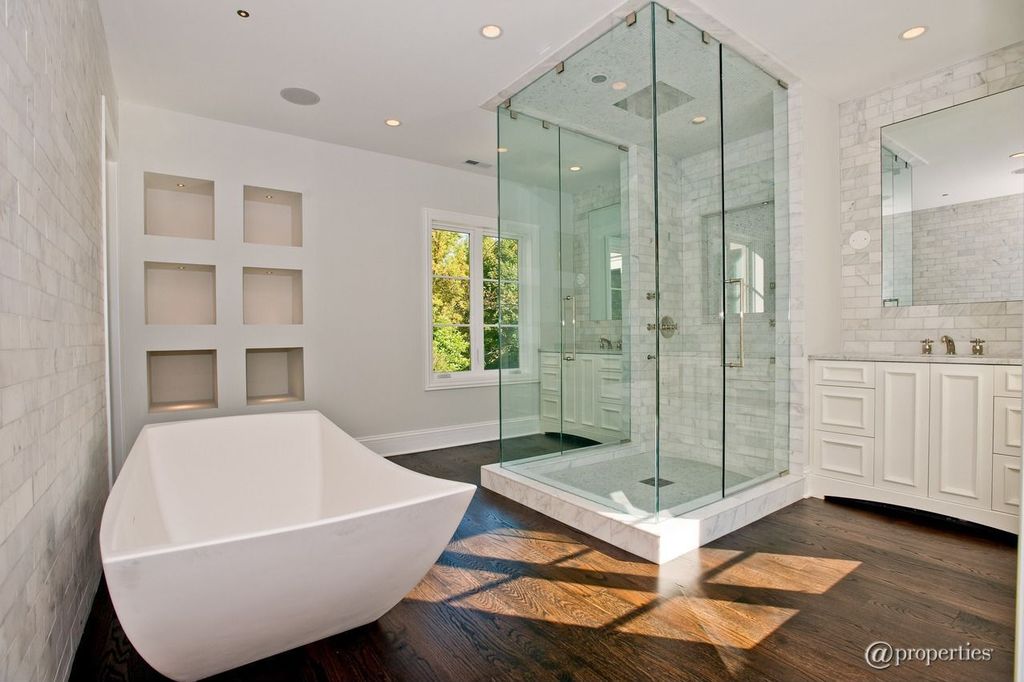 Contemporary Master Bathroom with Freestanding, frameless showerdoor, Frameless, Standard height, Bathtub, can lights, Shower