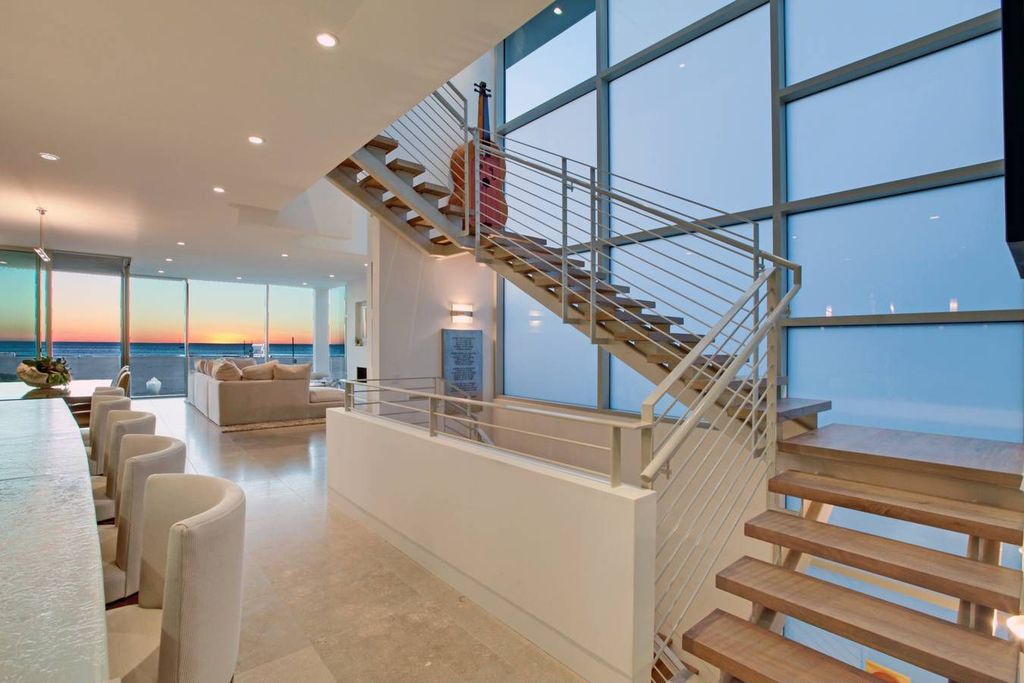 Contemporary Staircase with can lights, French doors, specialty window, High ceiling, Hardwood floors, specialty door
