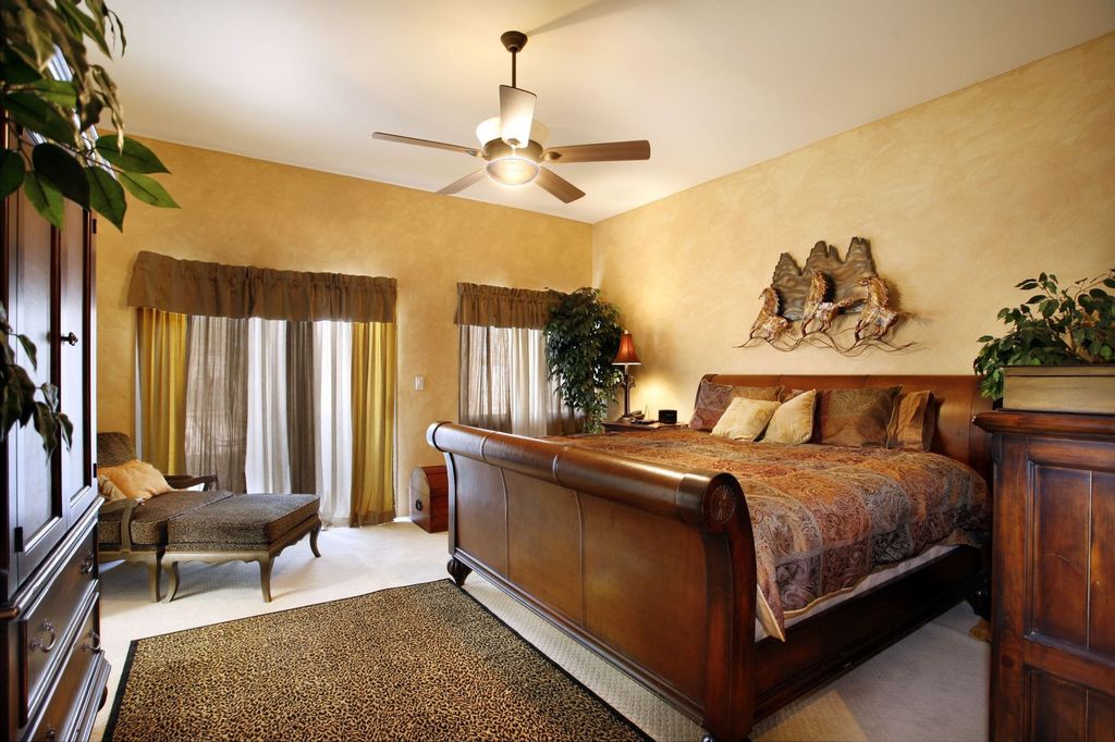 Eclectic Guest Bedroom with Standard height, Carpet, Ceiling fan