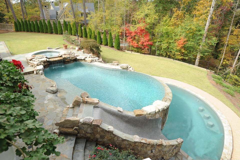 Rustic Swimming Pool with Other Pool Type, exterior stone floors, Fence, Pathway