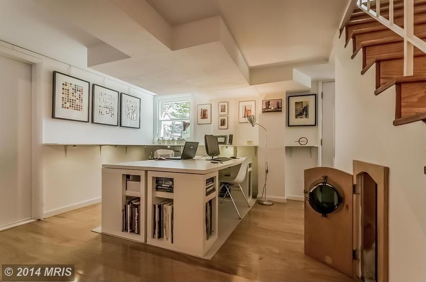 Contemporary Home Office with Standard height, Built-in bookshelf, double-hung window, Paint 1, Hardwood floors