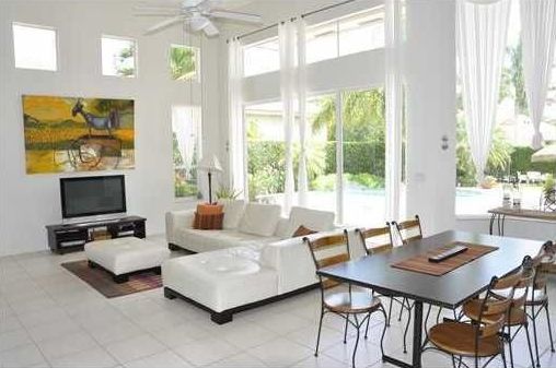 Contemporary Great Room with Ceiling fan, stone tile floors, sandstone tile floors, Standard height, picture window