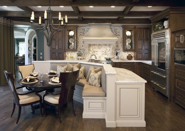 Traditional Kitchen with Hardwood floors, Chandelier, Kitchen island, Complex marble counters, Glass panel, Raised panel