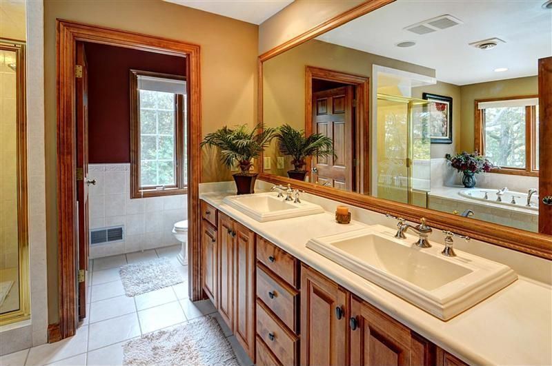 Craftsman Master Bathroom with Inset cabinets, Drop-in sink, six panel door, Shower, can lights, full backsplash, Casement