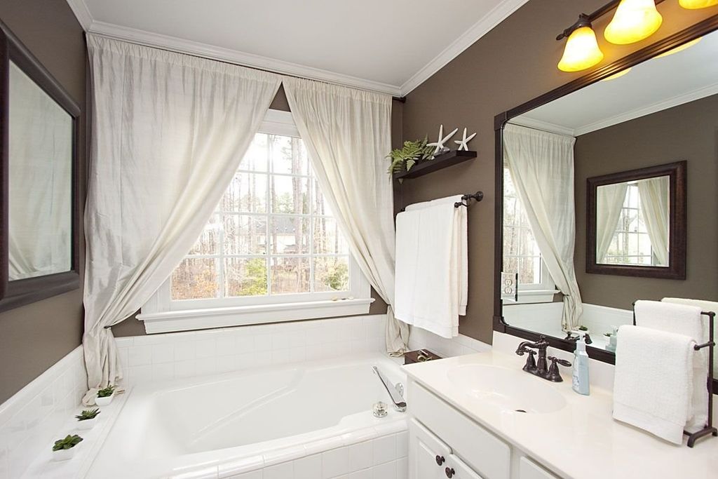 Cottage Full Bathroom with Paint, drop in bathtub, full backsplash, Raised panel, wall-mounted above mirror bathroom light