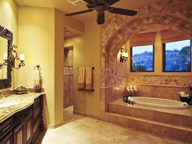 Traditional Master Bathroom with Franklin iron works - amber scroll 19-1/4" high wall sconce, Inset cabinets, Undermount sink