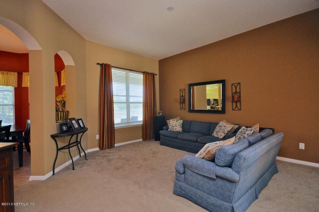 Traditional Living Room with Carpet & Wall sconce in Jacksonville, FL Zillow Digs