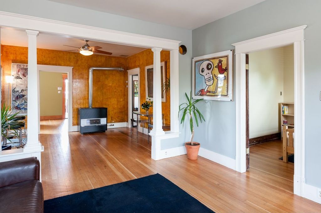 Traditional Living Room with Columns, Hardwood floors, Standard height